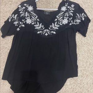 Size large embroidered Vici top.